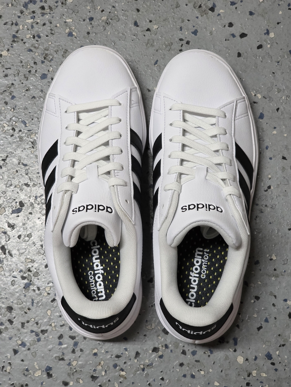 Adidas WomensWhite Sneakers with Black Stripes